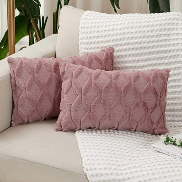 A 12x20 PINK TEXTURED PILLOW