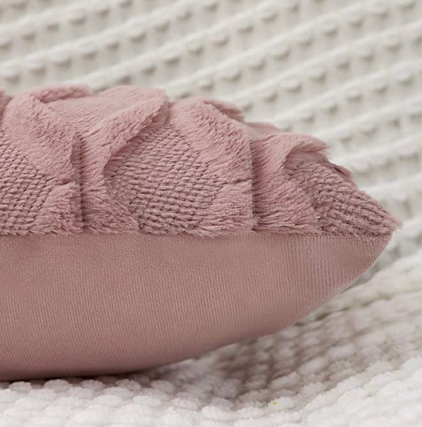 A 12x20 PINK TEXTURED PILLOW