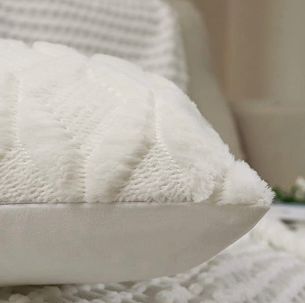 A 12x20 WHITE TEXTURED PILLOW