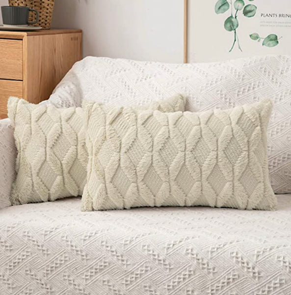A 12x20 BEIGE TEXTURED PILLOW