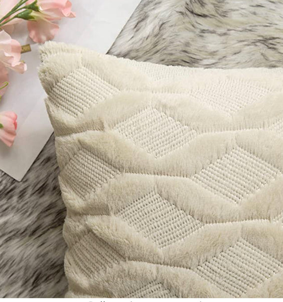 A 12x20 BEIGE TEXTURED PILLOW