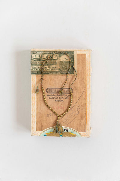 BRASS BEADS W/ TASSLE