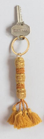 CC MUSTARD TASSLE KEY CHAIN